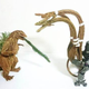 Image for article titled Godzilla Made from Pine Tree Branches Is a Lovely Fire Hazard